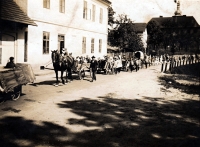 Post office in Stará Ves nad Ondřejnicí, in the background the roof of the castle tower / approximately 1930s