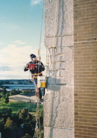 Josef Motyčka repairing a skyscraper in Australia, 1987