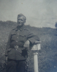 A friend with a border stone at Dukla