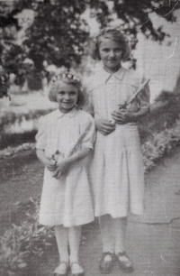 With her elder sister, Helena, during First Holy Communion 
