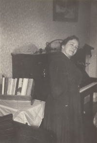 Rozálie Hrčková, aunt of Jan Bures, at the piano in January 1956