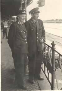 Father Jaroslav Adámek (right) in Jaroměř at the railway station