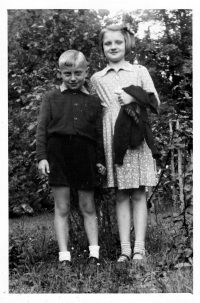 With his sister Hana, who tragically died in 1968