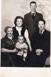 Family photo. Seated on the left: Barbara Hable (mother), Rudolf Hable, Hilda Hable (sister), Johann Hable (father). Standing: brother of Rudolf Hable, around 1949