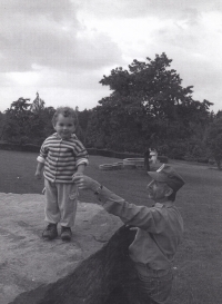 With granddaughter, 2003