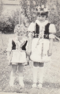 Daughters of Jaroslava Svobodová, Pavlína and Martina (from the left) in the Baráčník costume, celebration of the 50th anniversary of the founding of the Baráčník in Týn nad Vltavou, 1977