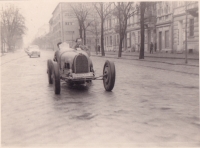 Father Miloš Schütz in his Bugatti car, 1947