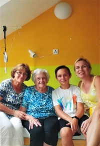 Milada Ambrožová with her daughter, granddaughter and great-grandson