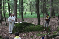 Mass at the scout camp, Jan Rabiňák is in the background