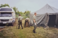 Field tent at the mass grave, Jan Svoboda third from the left, Bosnia and Herzegovina, 1999