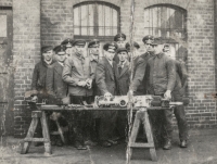 Railway employees at the Opava railway station before the witness's father Stanislav Losert (second from left below) was forced to go to France, early 1940s