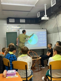 As a teacher in a Kharkiv school in front of the blackboard in September 2023