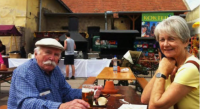 František Příhoda with Penny Krejzarová during a visit to the Czech Republic in 2012. They are in the brewery restaurant in Černý Kostelec