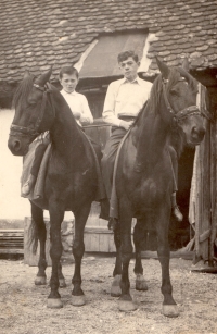 Václav Bradáč with his cousin Jaroslav Bláha. Similar horses were taken by the family during the deportation to Bărăgan, Gerník, 1960s