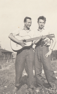 On the beach with a guitar, 1960s