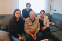 With his grandchildren Marek, Bětka (left) and Barbara at 80th birthday party, 2023