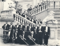 Excerpt from the promotional leaflet of the Ukrainian Radio and Television Orchestra, a witness standing on a staircase (eighth from the left, undated)