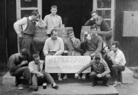 Fun after work at the road army - a veteran (standing in the middle) with colleagues in front of the house of the former labour camp in Holýšov