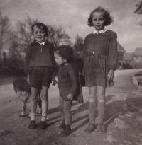 With siblings in 1952