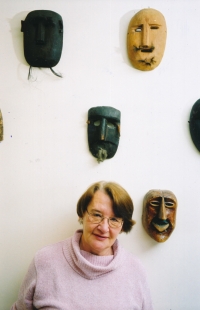 Jarka Stuchlíková surrounded by masks from Chile