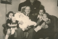 Hostovský family: from left: little Hana, her newborn brother Jan, great-grandfather Jan, mother Hana and sister Zuzana, behind: father Jan, 1950