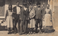 Wife on the right and parents standing on the left, Svatá Helena, undated