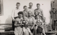 Ludmila Pavlovská with her family, bottom left: Ludmila Pavlovská holding her daughter Milada on her lap, father Antonín Lozrt, mother Ludmila Lozrtová holding her grandson Zdeněk (Ludmila Pavlovská's son) on her lap, above, from left: husband Josef, his mother Marie and father Josef, Ludmila's brother Antonín, Velké Losiny, ca. 1961