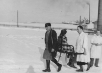 Josef Kindermann, the father of the witness (a white-coated nurse carrying a patient) / Bruntál / before World War II