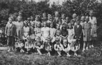 School in Žimutice, Erika is a tall girl second from the left, her friend Marie first from the right in the middle row, ca. 1951