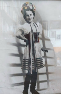 Witness's mother Josefa Šrámková at a masquerade ball wearing a folk costume