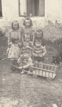  Jiřina Kozáková with her family children, top row, far left, 1956