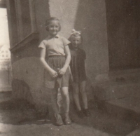 With younger sister, left, 1959