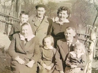 With family in Němčí, bottom row, second from the left, 1958