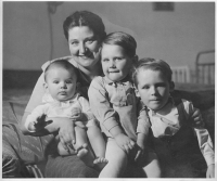 Tomáš Kučera in 1949. He is sitting on his mother Marie's lap, on the right are his brothers Antonín and Pavel