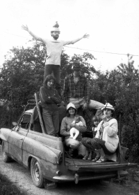 Ludvík Procházka in a hat with a group of friends at their cottage, first half of the 1980s