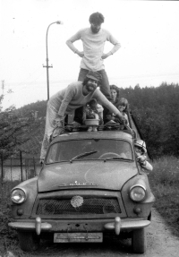 Above Ludvík Procházka with a group of friends at their cottage, first half of the 1980s