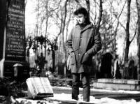 Ludvík Procházka at the grave of philosopher Ladislav Klíma in Prague's Malvasinky cemetery, probably in 1979