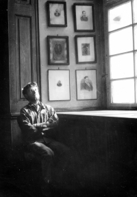 Ludvík Procházka at the window in the Baroque hall of the library in Prague's Klementinum, where he worked at the turn of the 1970s and 1980s