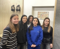 Students involved in the Stories of Our Neighbours project during the recording of an audio reportage about Ivo Houf, 2024