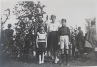 Witness´s family photo in the front, her mother in a festive costume called Libuše - 1933