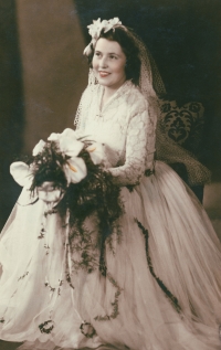 The witness in a wedding dress she made with her mother, Pilsen, February 1949