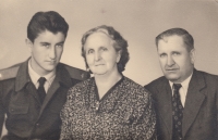 With parents, 1956