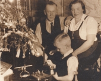 Bohumil Galásek with his parents. Christmas, 1945