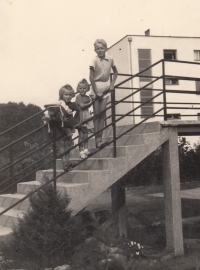 Witness (smallest in the middle) with her brother and cousin, 1940s