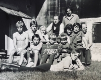 With family at the cottage. Witness in the top row in the middle, on the far left son Jiří Koudela, 1980