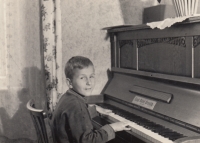 František Stůj behind a piano made by E. Meinl Graslitz, 1950s