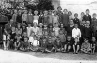 Olga Jaroňovaá (centre in dress with polka dots and white bordering), boarding school, Krompachy, Slovakia, 1936