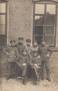 Father of the witness in the gendarmerie (far right)