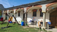 Stables on Ludmila Zatloukalova-Coufalova's former farm, changed owner several times since the revolution and was rebuilt several times, condition in 2024