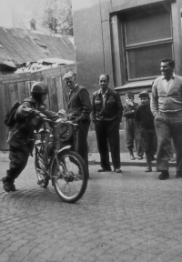 Witness with a motorcycle during races in the Jizera Mountains in the early 1960s